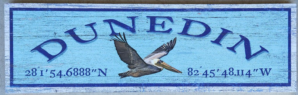 NEW Sign - Dunedin w/Pelican Latitude/Longitude - M
