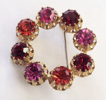 Load image into Gallery viewer, Vintage Goldtone Round Brooch - Red &amp; Purple Crystals
