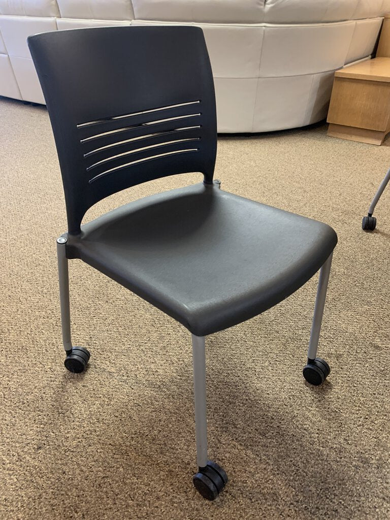 Strive Four-Leg Armless Chair w/Casters