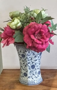 White & Blue Porcelain Vase with Floral Arrangement
